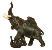 ϒ A Japanese Cast Bronze Group of an Elephant