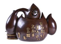 MIYA-O EISUKE: A Parcel Gilt Bronze Koro Group modelled as two bronze workers polishing a large amor