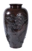 A Japanese Bronze Vase of ovoid form with a short neck and everted mouth