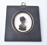 Arthur Lea (1768-1828)Portrait of a ladySilhouette painted on curved glass with verre églomisé borde