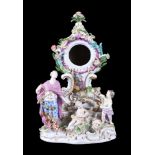 A Meissen (punkt) flower-encrusted allegorical clock case and stand, third quarter 18th century