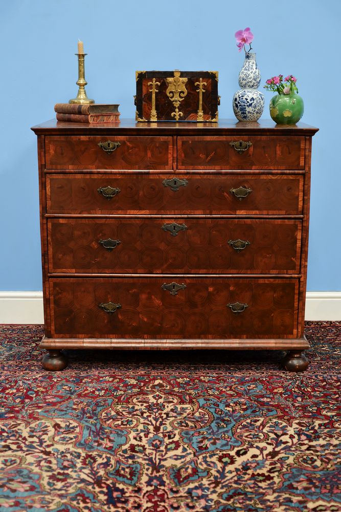 A William & Mary olive wood and walnut oyster veneered chest of drawers, circa 1690