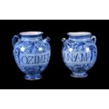 A pair of central Italian maiolica Berettino-ground wet-drug jars, late 17th century