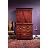 ϒ A William & Mary exotic hardwood, rosewood and seaweed marquetry cabinet on chest, circa 1690