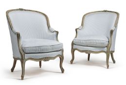 A pair of French grey painted and upholstered armchairs, 20th century