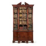 A George II mahogany breakfront library bookcase, circa 1755