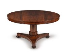 ϒ A William IV rosewood circular centre or dining table, circa 1835