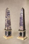 A pair of fine amethyst quartz veneered and marble mounted obelisks, 20th century