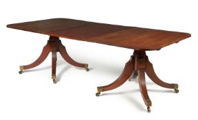 A mahogany triple pedestal extending dining table, circa 1800 and later