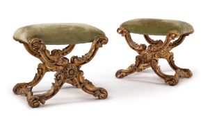 A pair of Continental carved giltwood stools, late 19th century