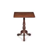 † A George IV carved mahogany and fustic occasional table, circa 1825