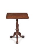 † A George IV carved mahogany and fustic occasional table, circa 1825