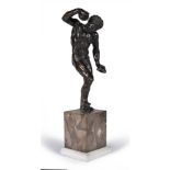 An Italian patinated bronze model of the Dancing Faun after the Antique, late 17th century