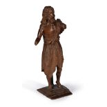 A Continental, probably German or French, sculpted walnut model of St John the Baptist, 16th century