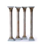 A set of four striated Egyptian alabaster and gilt bronze mounted columnar pedestals, late 19th cent