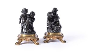 After Paul Emile Machault (French 1800 - 1866), a pair of patinated bronze groups of putti, late 19t