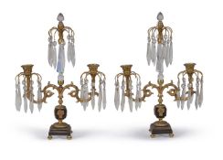 A pair of George IV gilt and patinated bronze and cut glass mounted twin light lustre candelabra, ci