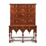 A William & Mary walnut and feather banded chest on stand, circa 1690