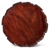 A George III mahogany 'pie crust' tray, circa 1770