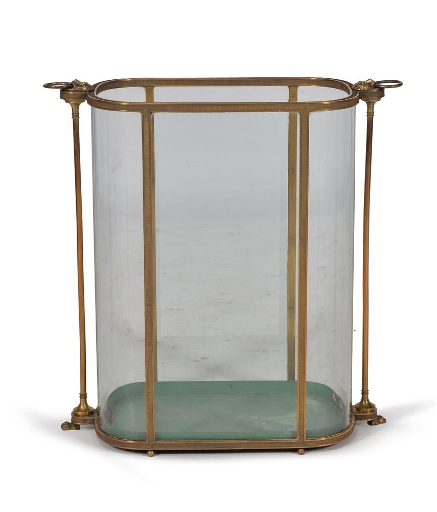 A gilt metal and glass panelled stick stand, late 19th/ early 20th century