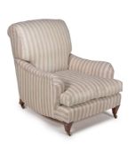 A Victorian mahogany and upholstered armchair by HOWARD & SONS, circa 1900