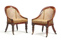 A pair of Regency simulated rosewood bergere chairs, circa 1815