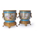 A pair of Paris porcelain and gilt metal mounted jardinieres, late 19th century