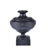 A Wedgwood & Bentley black basalt urn, circa 1775-80