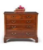 A George III mahogany and crossbanded chest of drawers, circa 1780