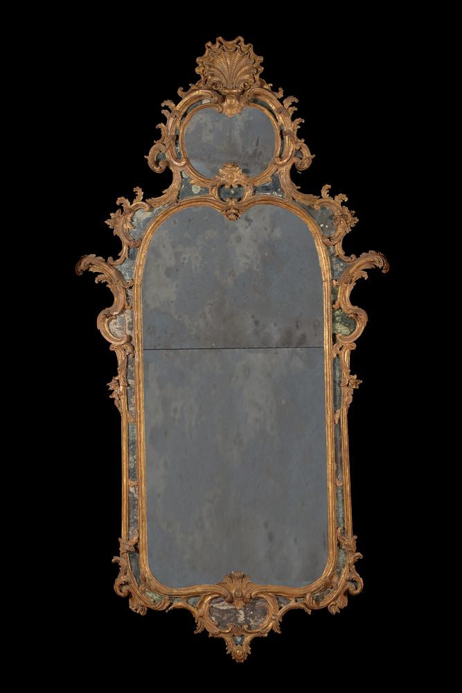 A pair of carved giltwood wall mirrors, in mid 18th century style, 18th century and later