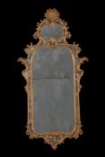 A pair of carved giltwood wall mirrors, in mid 18th century style, 18th century and later