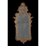 A pair of carved giltwood wall mirrors, in mid 18th century style, 18th century and later