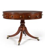 A George III mahogany drum library table, circa 1810