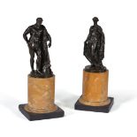 A pair of fine Italian Grand Tour patinated bronze souvenir models of the Farnese Hercules and Flora