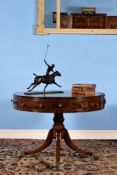 A William IV mahogany drum library table, circa 1835