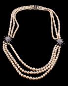 A cultured pearl and diamond necklace
