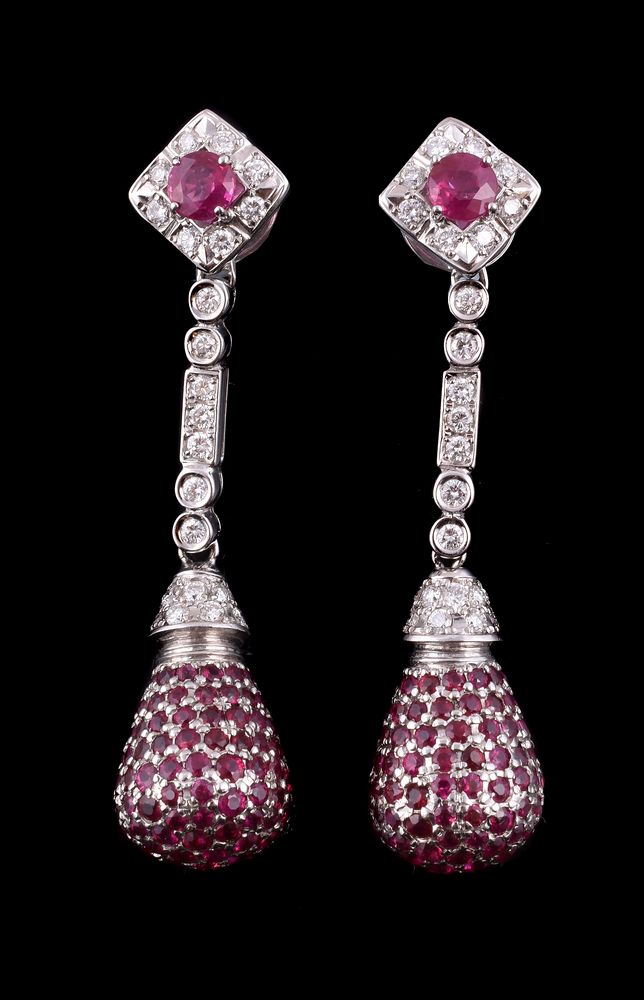 A pair of ruby and diamond ear pendants