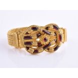 An Hellenistic style handmade woven gold bracelet by Natalia Josca