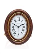 Cartier, an oval alarm clock