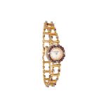 Jaeger-LeCoultre, a lady's yellow gold, ruby and diamond set bracelet watch