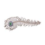 A diamond, emerald and sapphire peacock feather brooch