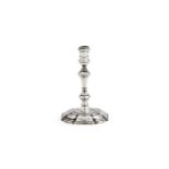 A George II cast silver taperstick by James Gould