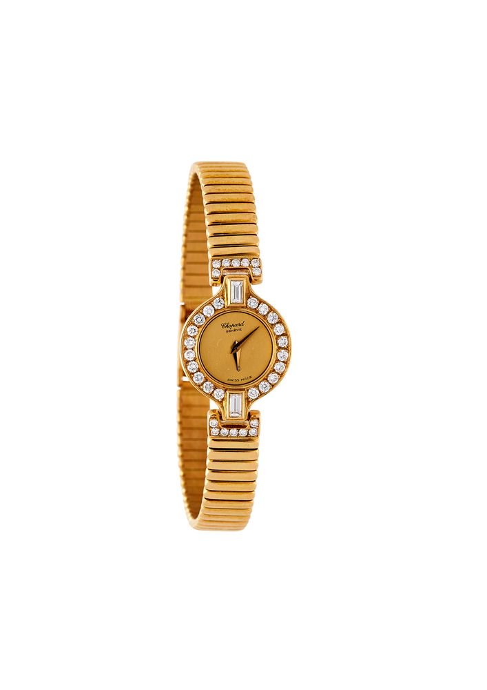 Chopard, a lady's gold coloured and diamond bracelet watch