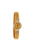 Chopard, a lady's gold coloured and diamond bracelet watch