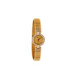 Chopard, a lady's gold coloured and diamond bracelet watch