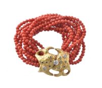ϒ A 1950s coral, diamond and emerald bracelet by Franco Cannilla for Masenza