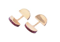 A pair of French ruby cufflinks by Cartier