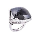 A black onyx and diamond ring