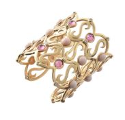 ϒ A French coral, pink tourmaline, peridot and diamond cuff