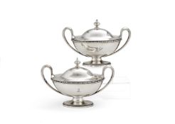 A pair of George III silver navette shape sauce tureens and covers by John Schofield